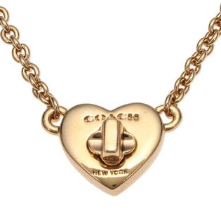 コーチCOACH　ターンロック　ハート型　ペンダント　ゴールド×シルバー　F54487 COACHコーチ プレーテッドブラス パヴェ ターンロック ライン